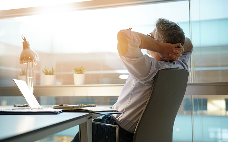 Relaxed man at desk